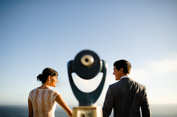 Genius wedding photo by Aaron Courter Photography of bride and groom looking out into distance between a viewfinder.